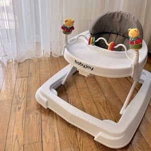 Baby Joy Walker with feeding tray and toys.